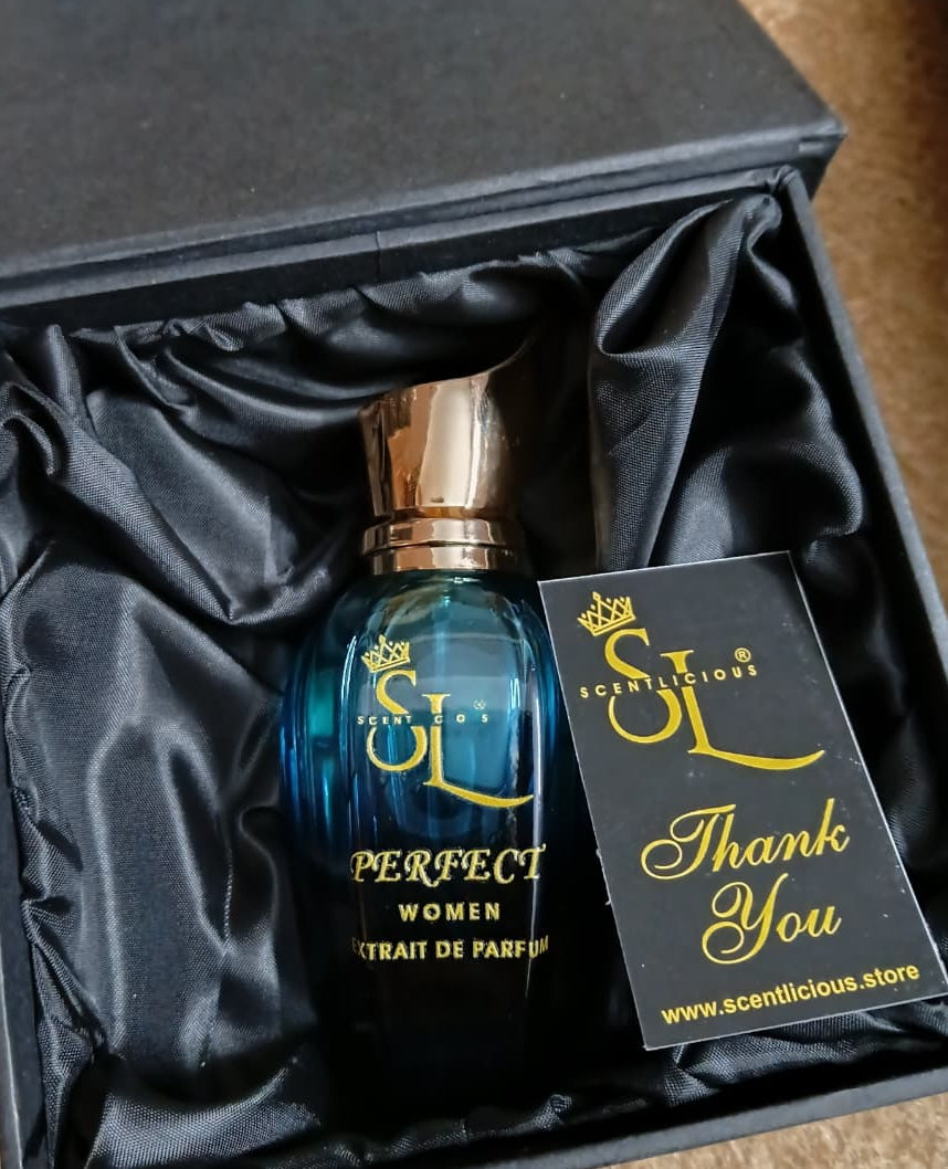 Perfume bottle with blue liquid and gold cap in a black satin-lined box, featuring a brand label.